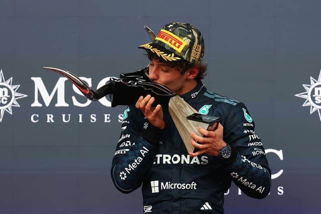 Race winner Kimi Antonelli celebrates on the podium after the Grand Prix of the United States in Austin, Texas on Sunday