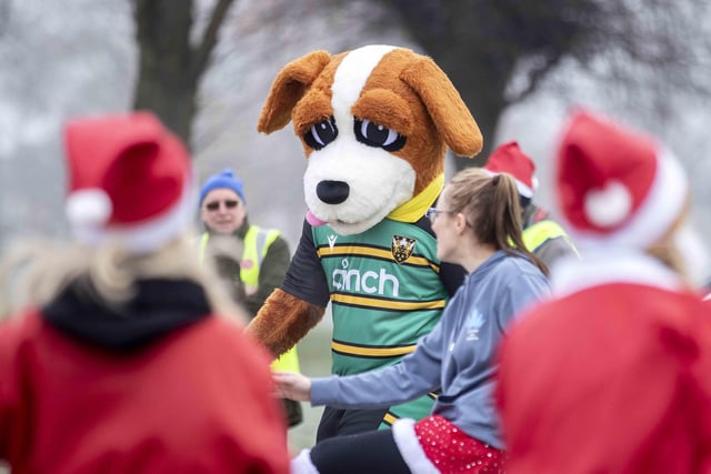 Hundreds of runners dressed as Santa braved the cold to run five kilometres for charity on Sunday December 11.