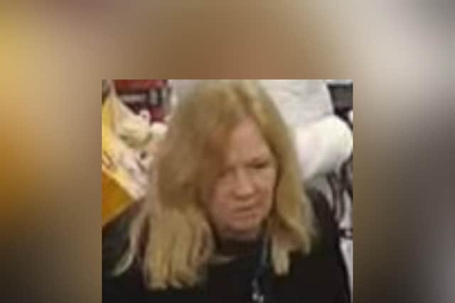 Police would like to speak to the woman in the image.