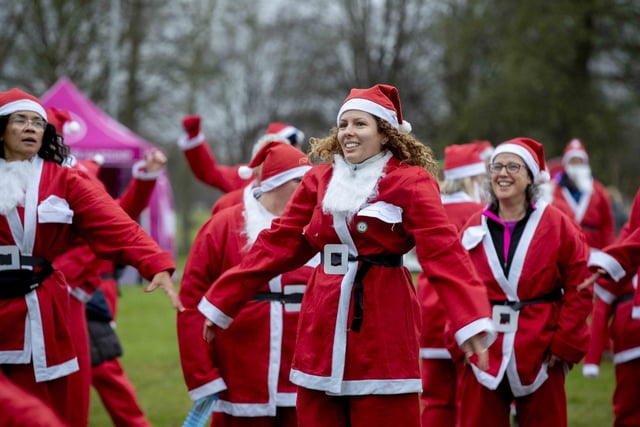 Hundreds of runners pulled on red suits for the festive run at the Racecourse in Northampton on Sunday December 10.