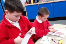 Joshua (left) and Aidan (right) busy using the Taylor Wimpey School Engagement Packs