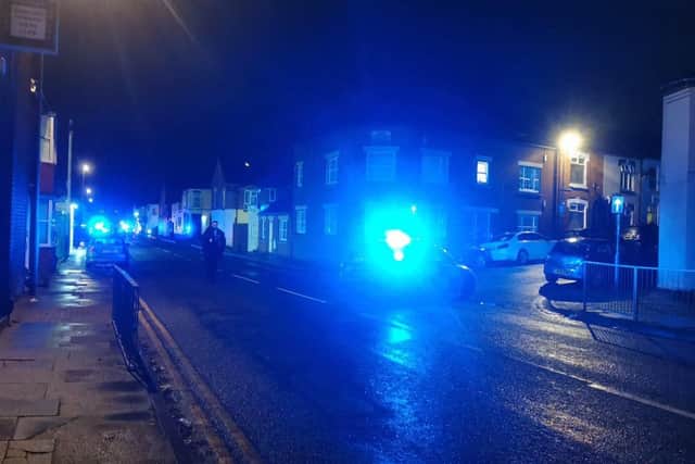 Five police car and several officers had cordoned off the area around the Easy Fix Autos garage in St Andrew's Road from Gordon Street to Hester Street.