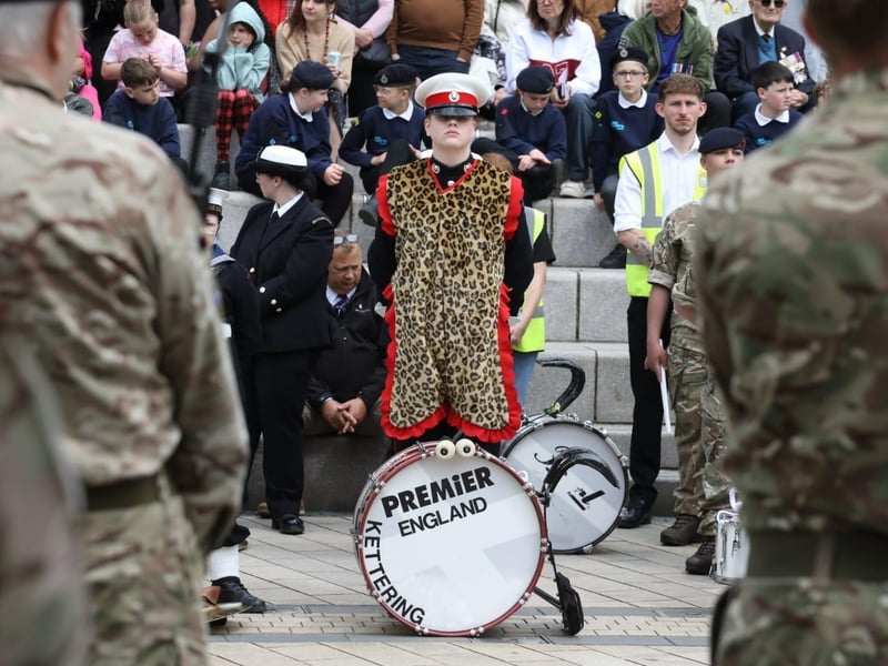 Kettering town centre: crowds line town centre to welcome The Royal Anglian Regiment for Armed Forces Day parade /National World