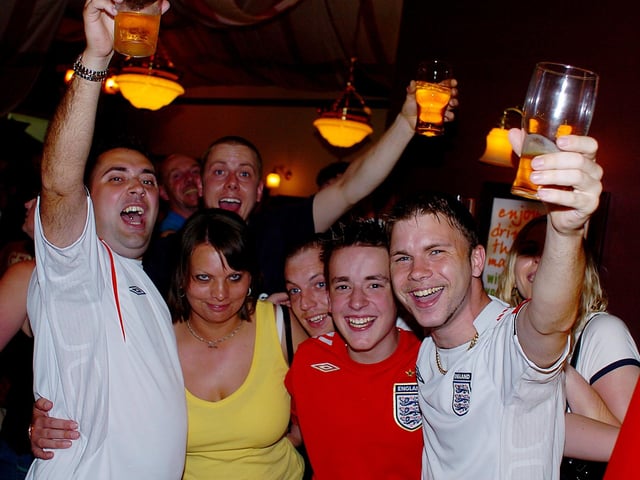 Fans celebrating the goal and win for England at the Abington Pub in Abington Northampton. Picture taken in 2006