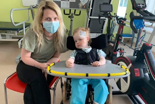 Laura with Margot during first week of neurorehabilitation in June 2021.