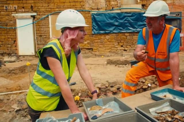 Presenter Alice Roberts and archaeologist Derek Roberts at the site