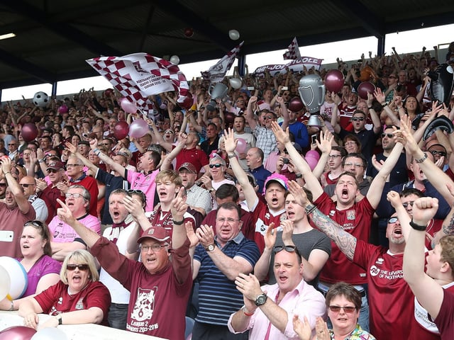 2016: Northampton Town fans welcome there team on the pitch prior to the Sky Bet League Two match between Portsmouth and Northampton Town at Fratton Park on May 7, 2016 in Portsmouth, England. (Photo by Pete Norton/Getty Images)