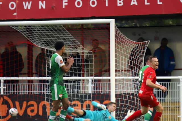 Martin Woods' fine strike beats Harrison Foulkes to give Brackley the lead