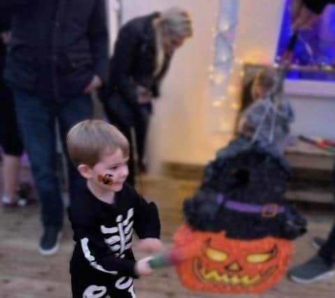 ‘Skeleton’ hitting a piñata