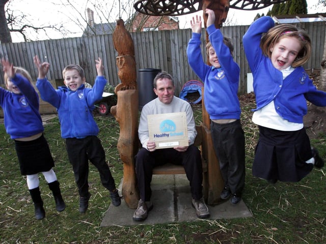 Bliss Charity School, Nether Heyford, Northants have won a healthy schools award. Amelia B, Riley, Head Teacher Chris Scanlan, Joshua, Hazel