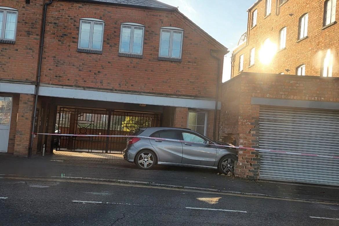 Mercedes car smashes into wall of a building in busy Northampton road