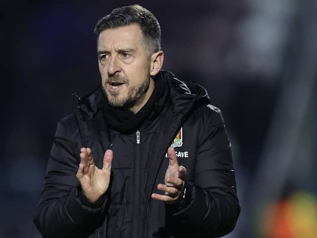 Cobblers boss Jon Brady was pleased with the performance of his depleted squad in Saturday's 1-1 draw with Wigan (Photo by Pete Norton/Getty Images)