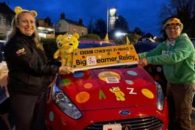 Pictured is Adrian Spires, of Gunner Pass driving school, being given the Children in Need top box to lead their convoy from Weedon to Nuneaton.