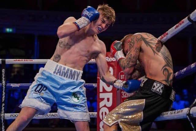 Eithan James in boxing action