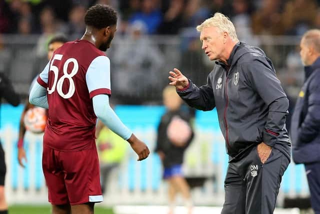 West Ham manager David Moyes talks to Kamarai Swyer during a pre-season friendly against Tottenham Hotspur in 2023. (Photo by James Worsfold/Getty Images)