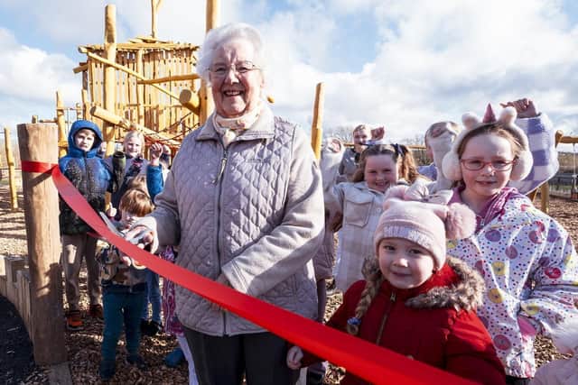 The playground was opened by local resident Janet Mills and twenty 'play testers'.