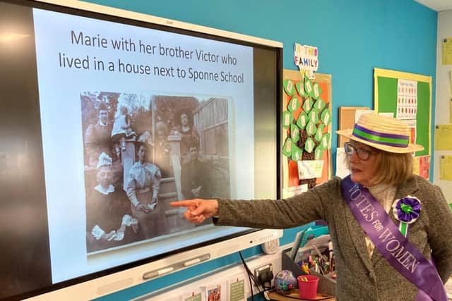 Towcester Evening WI member, Sue Hamilton, sharing a presentation on the life of Marie Weller to the Year 1 classlass of 