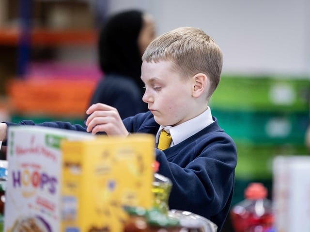 70 bags of food were packed by the 11 hardworking students, who learnt the importance of showing kindness and empathy to the community.