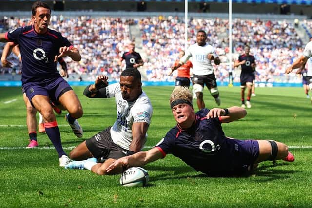 Henry Pollock scores the first of his three tries for England against Fiji