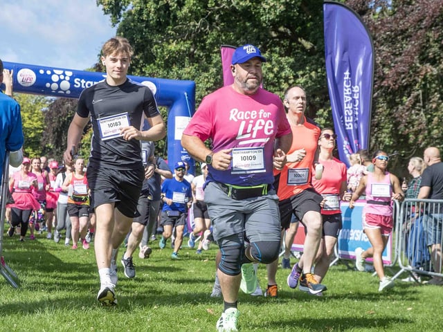 Walkers, runners and joggers completed two laps of Abington Park for the 10k Race for Life on Sunday (July 14).