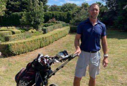 Mark Bushell's best friend Paul Lyman (pictured) playing golf with Mark's clubs, as family and friends watched on.