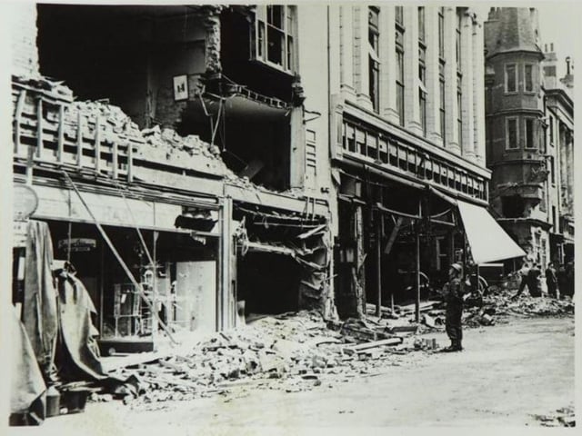 An RAF bomber that crashed in Northampton in 1941 damaged many shops in Gold Street, including what was then Burton tailor's shop
