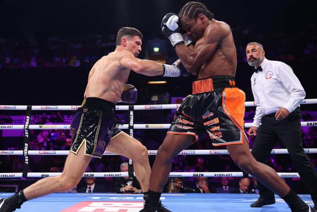 Kieron Conway lands a body shot against Gerome Warburton (Picture: Mark Robinson / Matchroom Boxing)