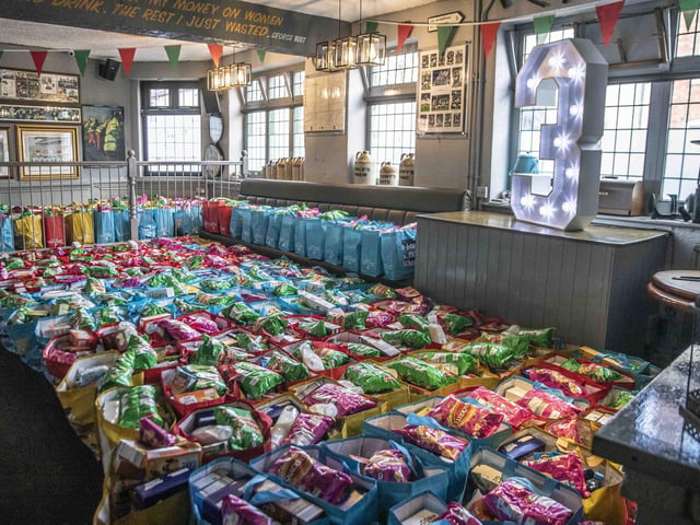 1,700 food parcels were given to more than 70 schools across the county to mark the charity’s third anniversary.