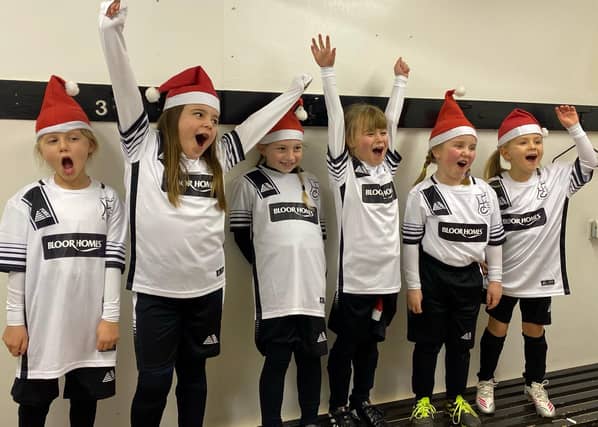 It’s a happy new-kit-mas for Harpole U7s Girls team thanks to a donation from Bloor Homes