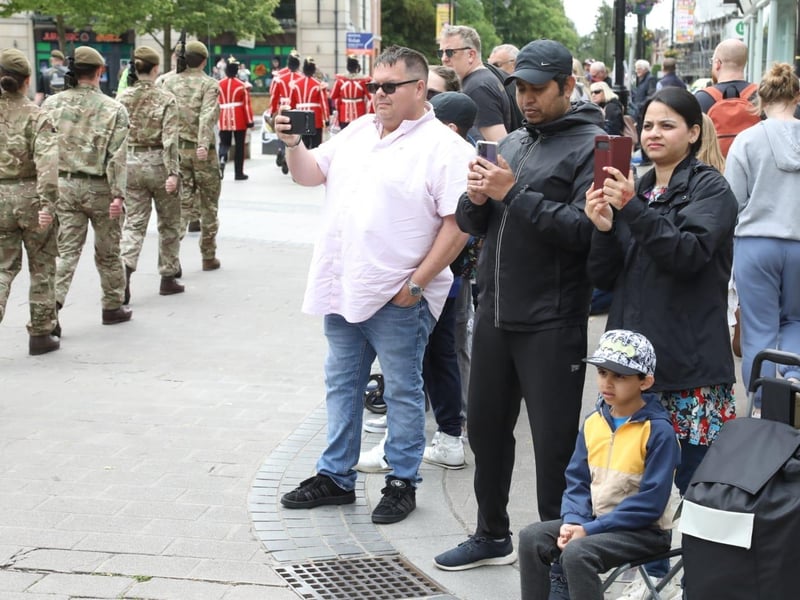 Kettering town centre: crowds line town centre to welcome The Royal Anglian Regiment for Armed Forces Day parade /National World