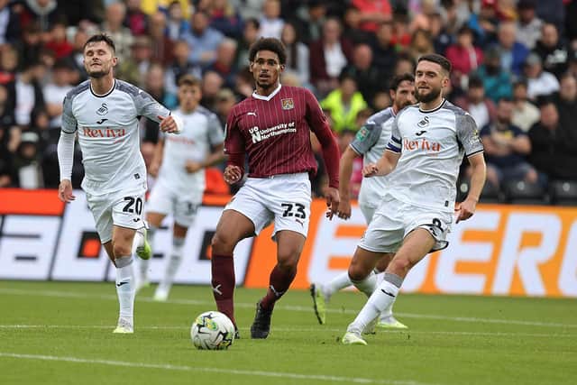Will Hondermarck passes to a team-mate during the Carabao Cup first round match between Swansea City and Northampton Town at the Swansea.com Stadium. (Photo by Pete Norton/Getty Images)