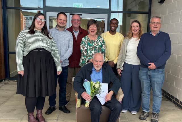 Toby with trustees and staff