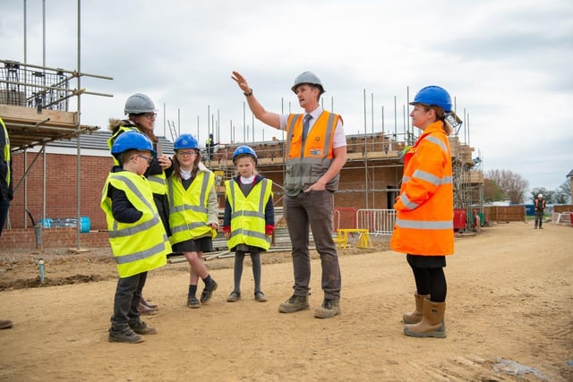 DWSM - SGB-13409 - Site Manager David Holden showing Overstone Primary School around the development