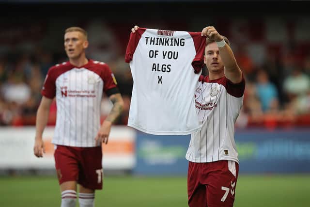 Sam Hoskins' tribute after scoring the Cobblers' opener at Crawley on Tuesday (Picture: Pete Norton)