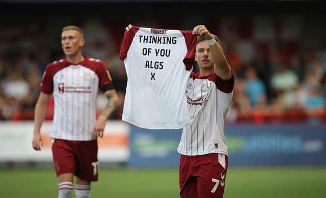 Sam Hoskins' tribute after scoring the Cobblers' opener at Crawley on Tuesday (Picture: Pete Norton)