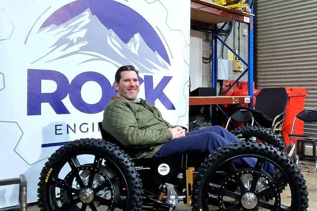 Nick Wilson aka Disabled Adventurer sat in RockClimber at Rock Engineering factor in Towcester