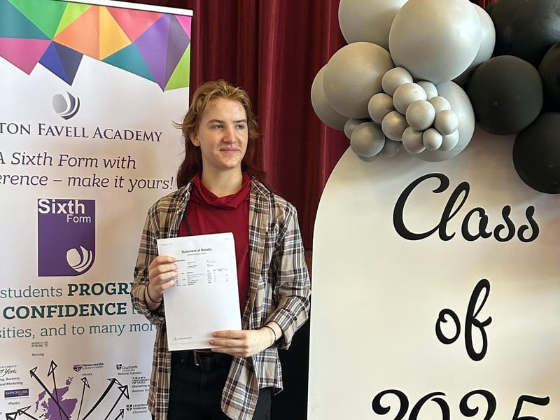 Haeden Ritchie-Urqhart with his results at Weston Favell Academy