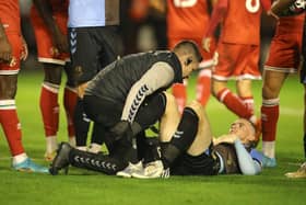 Cobblers physio Michael Bolger has been a busy man