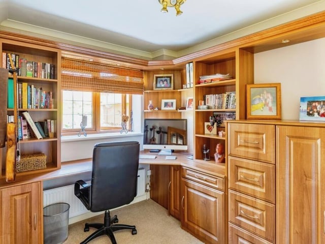 A wood-panelled is an ideal place for working from home buy can be converted into any use