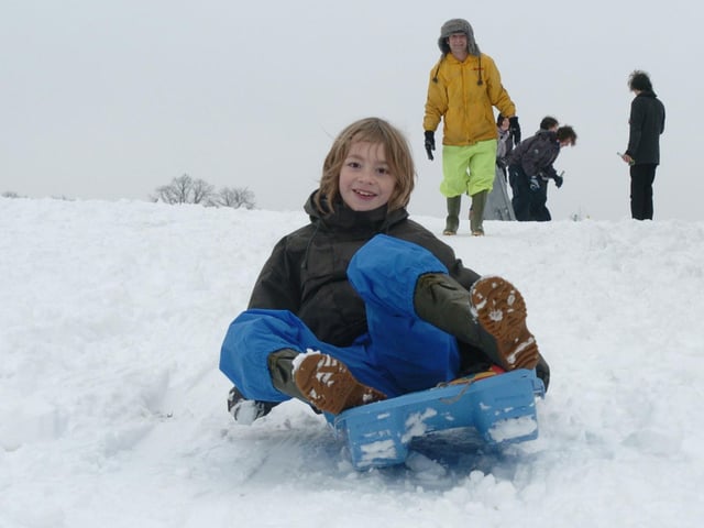 Alfie Gardner, nine, sledges down a hill at the racecourse. Thursday, 5th February 2009
