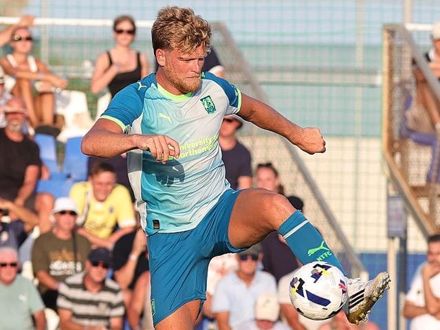 Cameron McGeehan takes down the ball