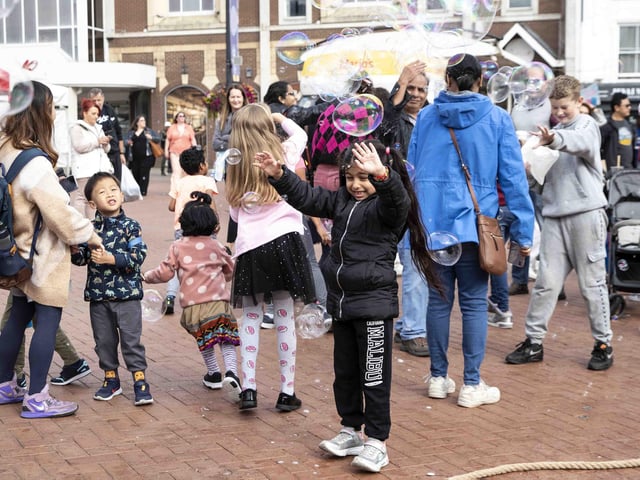 Hundreds enjoyed music, circus acts, and memories from the decade during a sixties celebration event in Northampton's Market Square on Saturday (September 24).