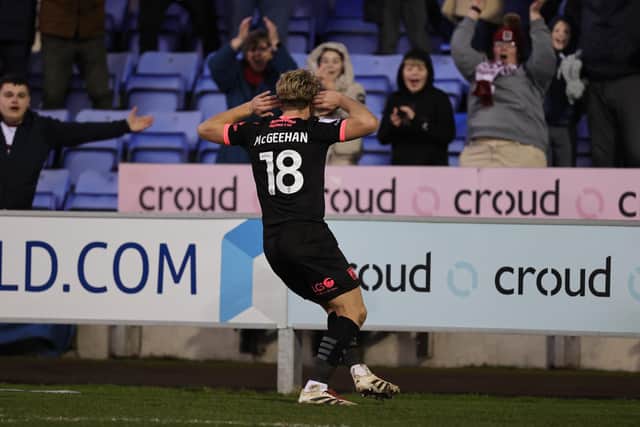 Cameron McGeehan celebrates his seventh goal of the season after levelling against Shrewsbury