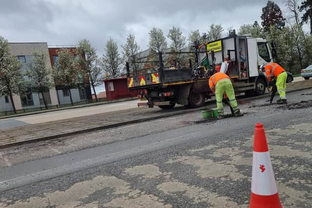 WNC highways workers were spotted filling in the potholes on Tuesday (March 19) after this newspaper contacted WNC for comment