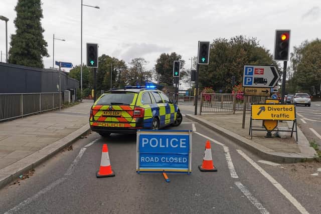 Police cordoned off a Northampton bridge after a car drove at two pedestrians.