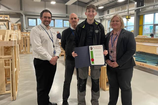 Tom Stanton with staff from the construction team at Northampton College