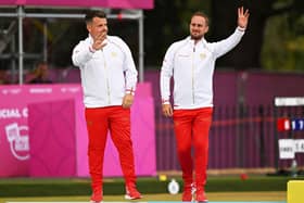 Team England silver medalists Jamie Walker (left) and Sam Tolchard acknowledge the applause of supporters as they take to the podium at Leamington Spa