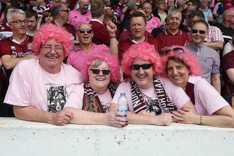 Northampton Town fans wear pink for the last game of the season prior to the Sky Bet League Two match between Portsmouth and Northampton Town at Fratton Park on May 7, 2016.