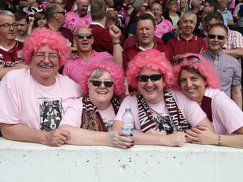 Northampton Town fans wear pink for the last game of the season prior to the Sky Bet League Two match between Portsmouth and Northampton Town at Fratton Park on May 7, 2016.