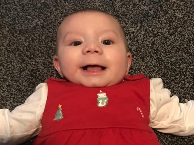 Six-month-old Alice's first Christmas.